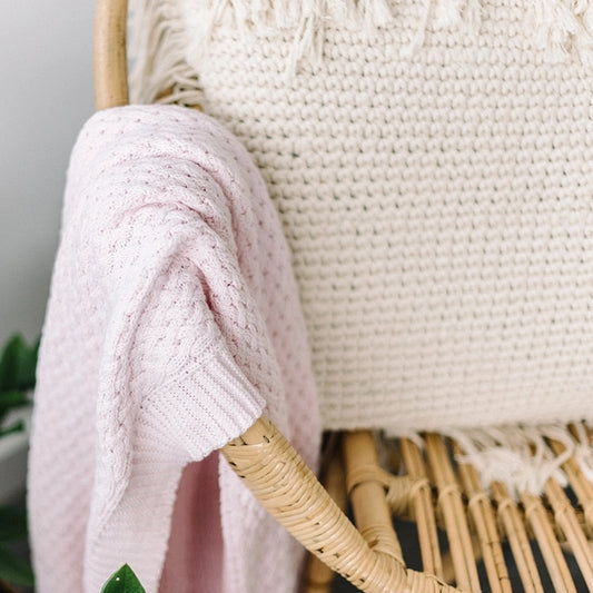 Blush pink diamond knit baby blanket from Snuggle Hunny Kids is now available on Sugarbird Kids.